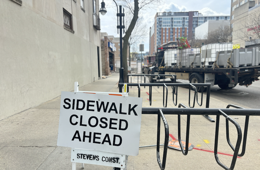 Part of the sidewalk on Lake Street has been closed down since early 2024 to accommodate construction on a new mixed-use development.